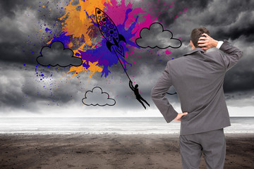 Poster - Composite image of young businessman standing back to camera scr