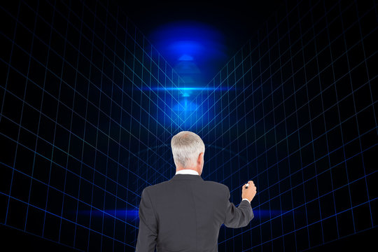 Composite image of rear view of businessman standing and writing