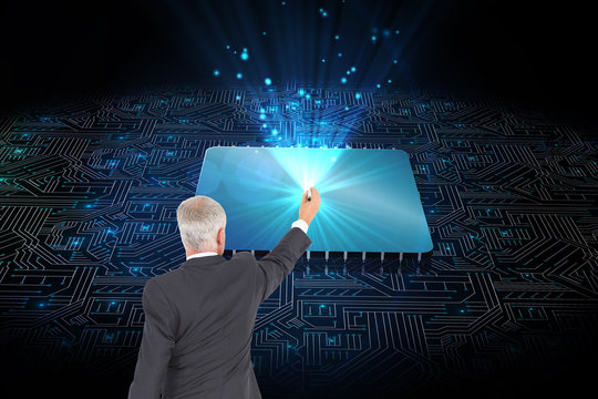 Composite image of rear view of serious businessman standing and