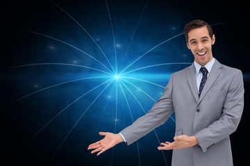 Poster - Composite image of happy businessman giving a presentation with
