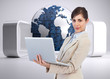 © WavebreakmediaMicro - Composite image of confident young businesswoman with laptop