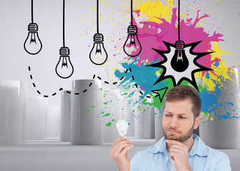 Poster - Composite image of sceptical model holding a bulb