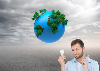 Poster - Composite image of charming model holding a bulb in right hand