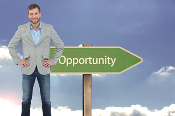 Poster - Composite image of stylish man smiling with hands on hips