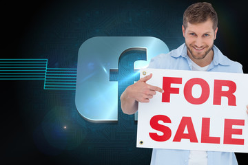 Poster - Composite image of smiling model holding a for sale sign