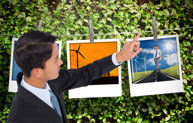 Aufkleber - Composite image of unsmiling asian businessman pointing