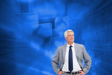 Poster - Composite image of man in a suit with his hands on his hips