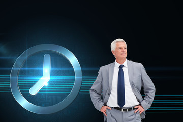 Poster - Composite image of man in a suit with his hands on his hips