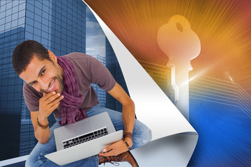 Poster - Composite image of thoughtful man sitting on floor using laptop