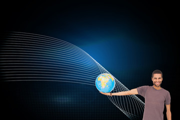 Poster - Composite image of handsome man holding out a globe