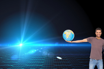 Poster - Composite image of handsome man holding out a globe
