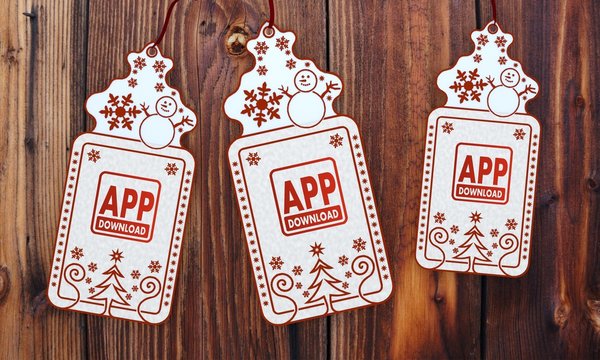 three christmas cards with app download sign