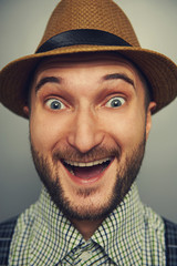 Poster - excited hipster man in straw hat