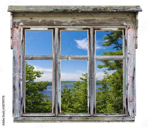 Nowoczesny obraz na płótnie Scenic view seen through an old window frame