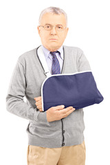 Poster - Senior man with broken arm posing