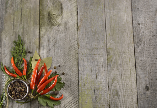 Naklejka nad blat kuchenny Hot chili corner border on wood