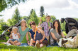 © Tyler Olson - Happy Mothers And Children Enjoying Picnic