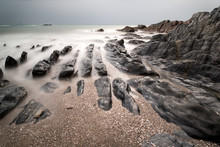 Landscape Seascape Of Jagged And Rugged Rocks On Coastline With