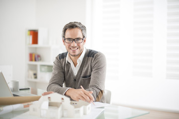 architect working at his laptop on the office