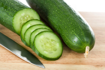 Canvas Print - Cut cucumbers and knife