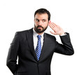 © luismolinero - Young business man hearing something over white background