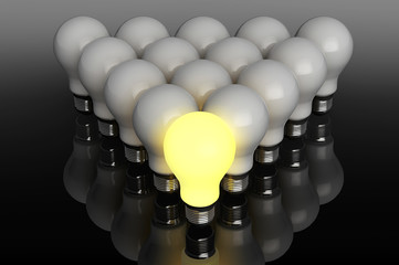 Aufkleber - Leadership concept. One glowing light bulb standing in front of