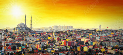 Istanbul Mosque with colorful residential area in sunset Tableau sur Toile
