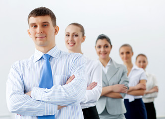 Wall Mural - Group of business people standing in row