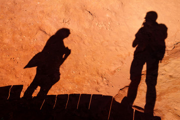 Tourists shadows on Le Sentier des Ocres in Roussillon in France