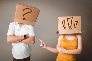 Handsome men in suit gesturing with drawn question marks on box