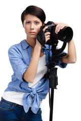 Wall Mural - Girl takes snaps holding photographic camera