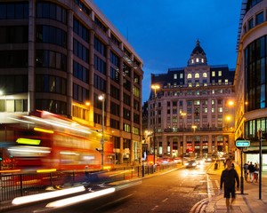 Fast moving cars at streets of London at night