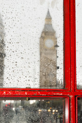 Fototapete - Big ben and red phone cabine. Rainy day