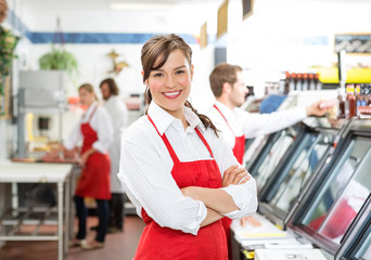 Confident Female Butcher Standing Arms Crossed