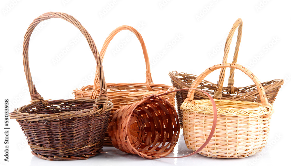 Empty wicker baskets, isolated on white - obrazy, fototapety, plakaty 