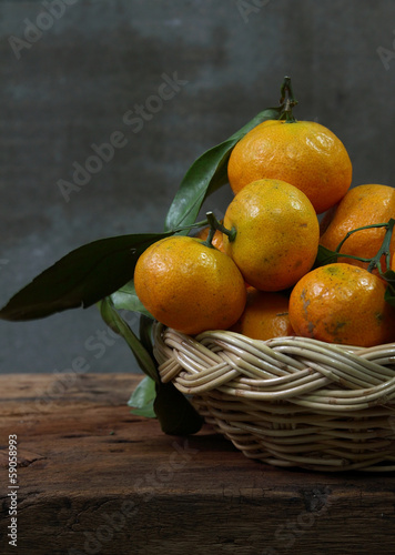 Nowoczesny obraz na płótnie Still life with tangerines in basket