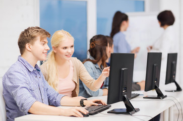 Wall Mural - students with computer monitor at school
