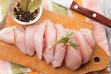 Wall Mural - Fresh chicken on wooden table