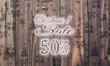© Thomas R. - wooden Christmas discount 50 percent off symbol with presents