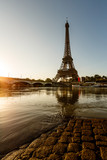 Fototapeta Boho - Eiffel Tower and Cobbled Embankment of Seine River at Sunrise, P