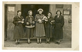 Fototapeta Młodzieżowe - CIRCA 1949 - young women before old building