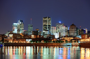 Wall Mural - Montreal over river at dusk