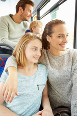 Wall Mural - Family Enjoying Bus Journey Together