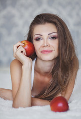 Wall Mural - Sexy beautiful woman lying on a white bed