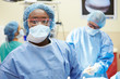 © Monkey Business - Portrait Of Surgeon Working In Operating Theatre