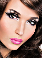 Canvas Print - Beautiful brunette woman with bright fashion make-up