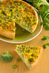 Wall Mural - Vegetable pie with broccoli, peas and cheese.