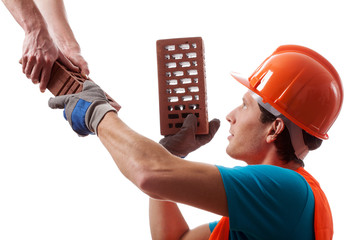 Wall Mural - Man in hard hat building a house