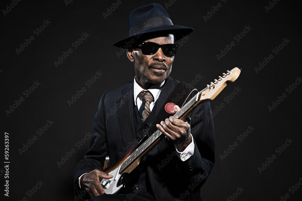 Retro senior afro american blues man. Wearing striped suit with - obrazy, fototapety, plakaty 