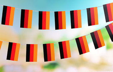 Wall Mural - Garland of flags on bright background